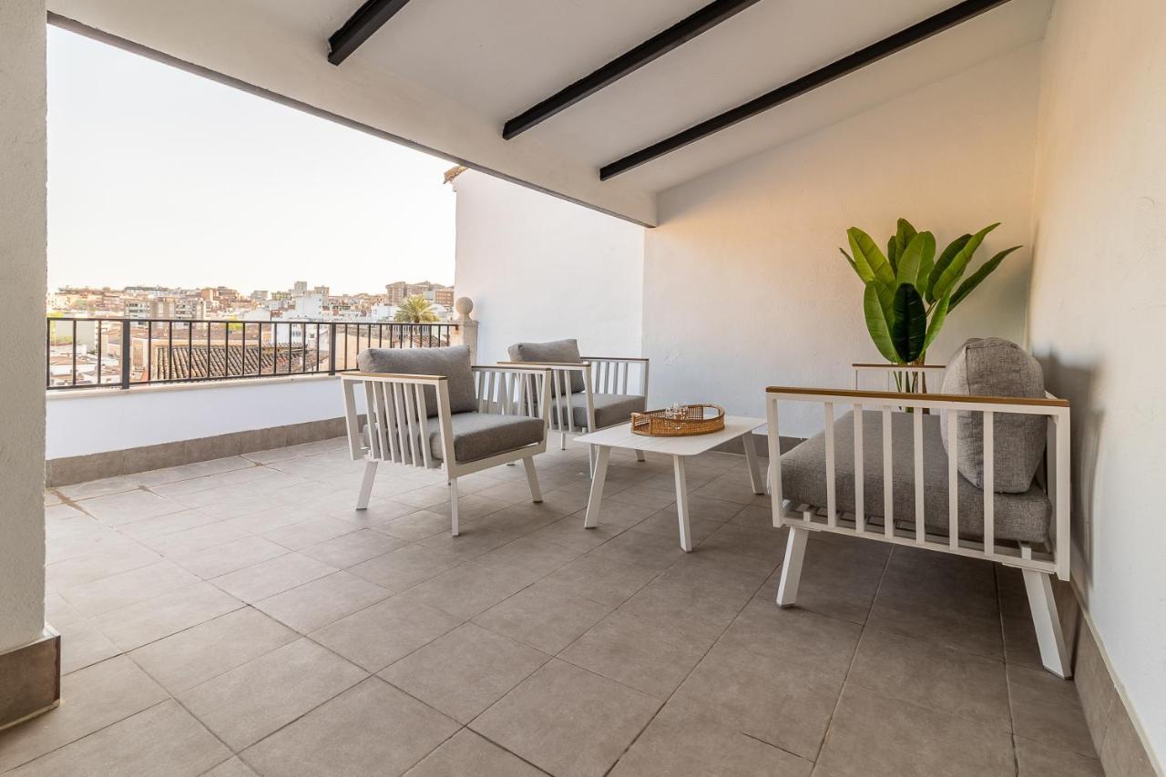 Apartamentos El Patio Plaza Santa Clara Caces Kültér fotó